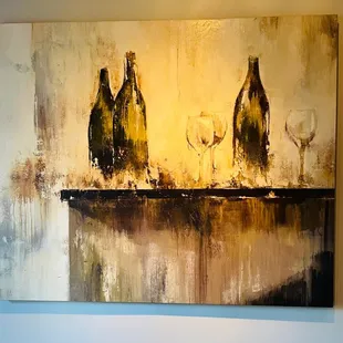 a painting of three wine bottles on a table