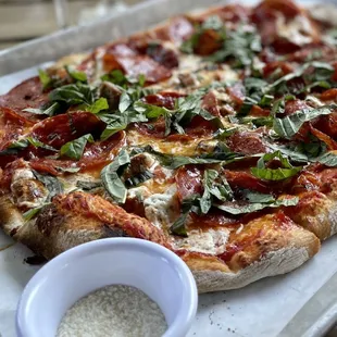 THE SPOTTED PIG Tomato Sauce, Mozzarella, Provolone, Parmesan, Wild Boar Meatballs, Soppressata, Basil