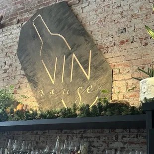 Business sign over bar