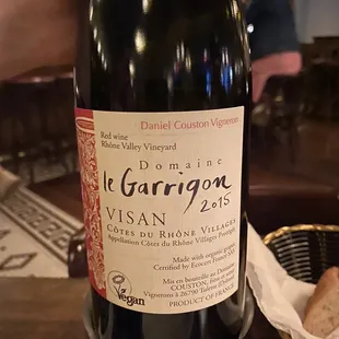 a bottle of wine on a table