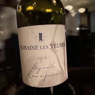 a bottle of wine on a table