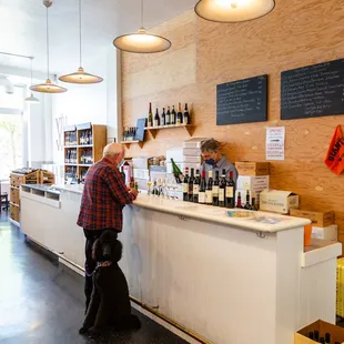a man standing at a bar