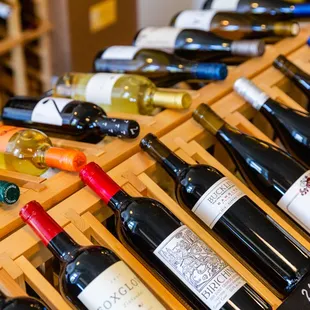 a wine rack full of wine bottles