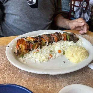 a plate of sushi and rice