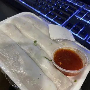 a plate of food with a keyboard in the background