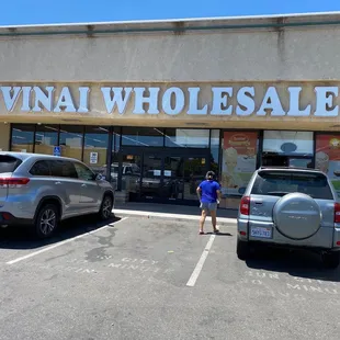 a woman standing in front of a store