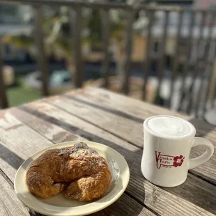 Good morning cap and a day ol almond croissant. $6 total and both are excellent. This is my favorite spot when I&apos;m in town