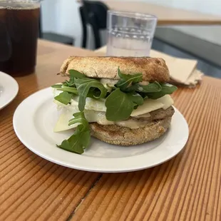 Sausage McVinal with arugula on Multigrain English Muffin