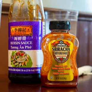a bottle of sauce and a bottle of sauce