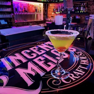 a cocktail in a martini glass