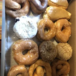 Bakers Dozen $9.75 Glazed, cinnamon twist, chocolate cake, maple crumb cake, maple cream sticks, powdered black raspberry jelly.