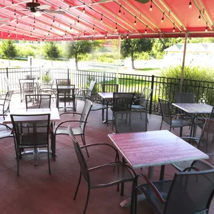 tables and chairs on a patio