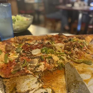 Everything but.  All toppings-no anchovies.  that&apos;s oil in the middle for you to slop up with your crust! A. MAZING.