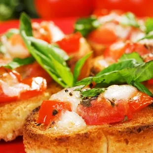Fresh Tomatoes, Parmesan Cheese, Garlic, Green Onions &amp; Olive Oil on Toasted Baguette Bread