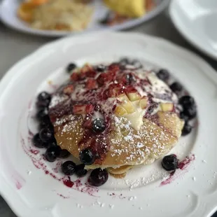 The piña colada pancake was doughy, not thick and fluffy. The blueberries were good.