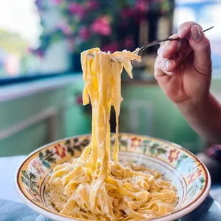 Cheese Wheel Fettuccine Alfredo