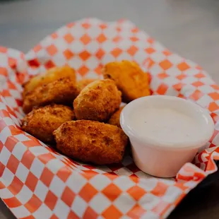 a basket of fried chicken nuggies