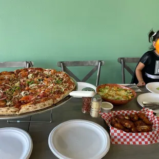 Large pizza wings Caesar salad