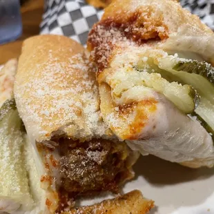 Meatball Parmigiana Hero plus pickles!  Don't knock it! Lol