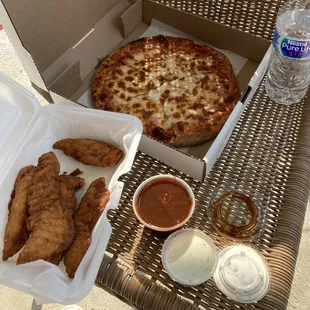 a pizza and fries