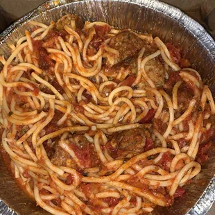 Spaghetti and marinara (added on meatballs for an extra charge)