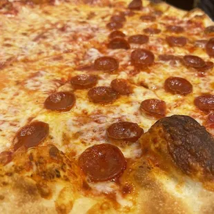 Half pepperoni and cheese