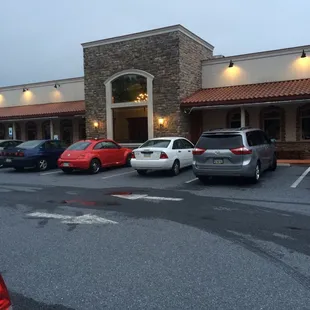 several cars parked in a parking lot