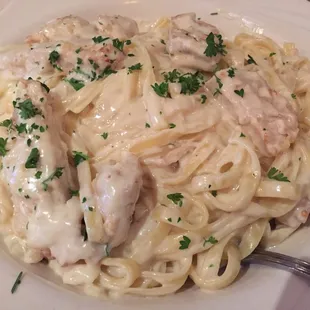 Fettuccini Alfredo w/ chicken. Portion huge and plenty of leftovers to go home.