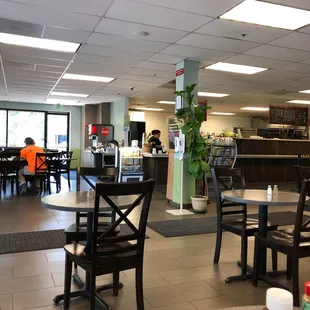 Indoor seating clean, modern and plentiful.