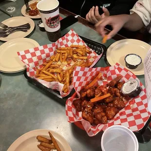 Boneless wings and fries.