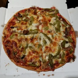 Extra thin pizza, sausage mushroom green pepper.