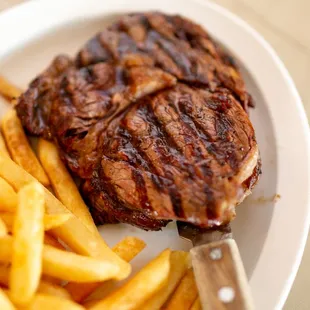 a steak and french fries