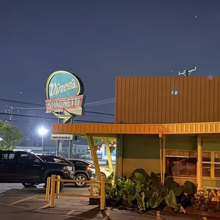 Front of store with sign