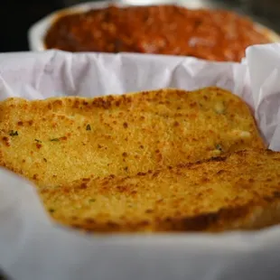 a basket of breaded fish