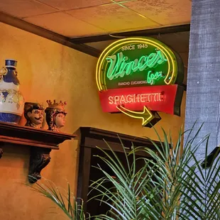 a neon sign in a restaurant