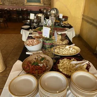 Wide array of items on the buffet including Vinci&apos;s Caprese Salad