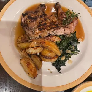 Hen with potatoes and kale