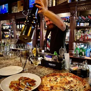 a man making a pizza