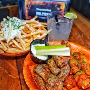 Mango habanero and dill pickle wings with vindicktive fries