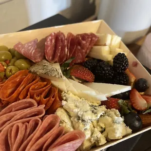 a variety of meats and cheeses