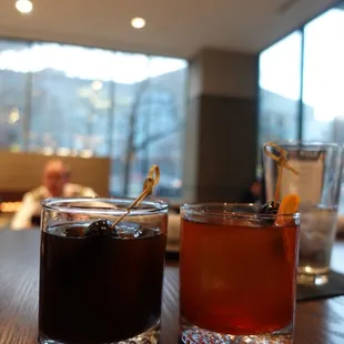 two glasses of tea on a table
