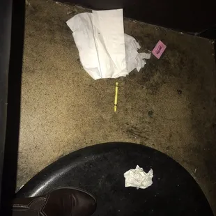 This is a photo of the floor underneath the table at the booth we sitting at on 1/16/22 in the bar side. Need I say more!!!