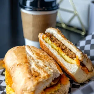 a sandwich and a cup of coffee