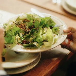 a person eating a salad