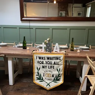 a table with a sign on it