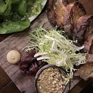 Chicken liver mousse (the best), caramelized onions, frisée. (Butter lettuces partly pictured)