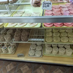 a display of cookies and pastries