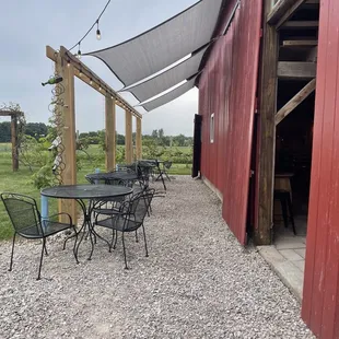 patio area with tables and chairs