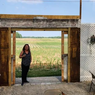 We sat in the main patio area in front of the barn. This extra seating area made a nice pic with new corn just getting started in the backgr
