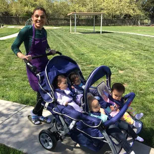 Our adorable infants out for their daily walk in the expansive backyard.